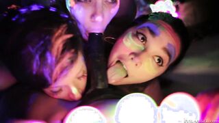 Sexy lesbo girls playing with fluorescent body paint