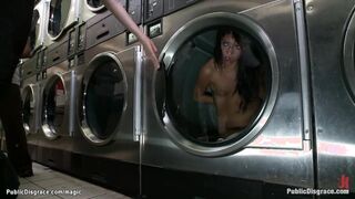 Slave in waching machine in public