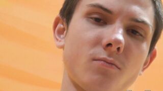 Slim twink Eryk wanking off big foreskin covered cock hard