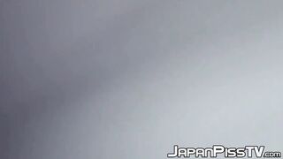 Delectable Japanese beauty is peeing outside during day time